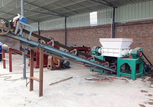 Double shaft shredder machine can shredding tyre ,The TS-1200 tire shredder is used to shred the whole tires into rubber blocks.